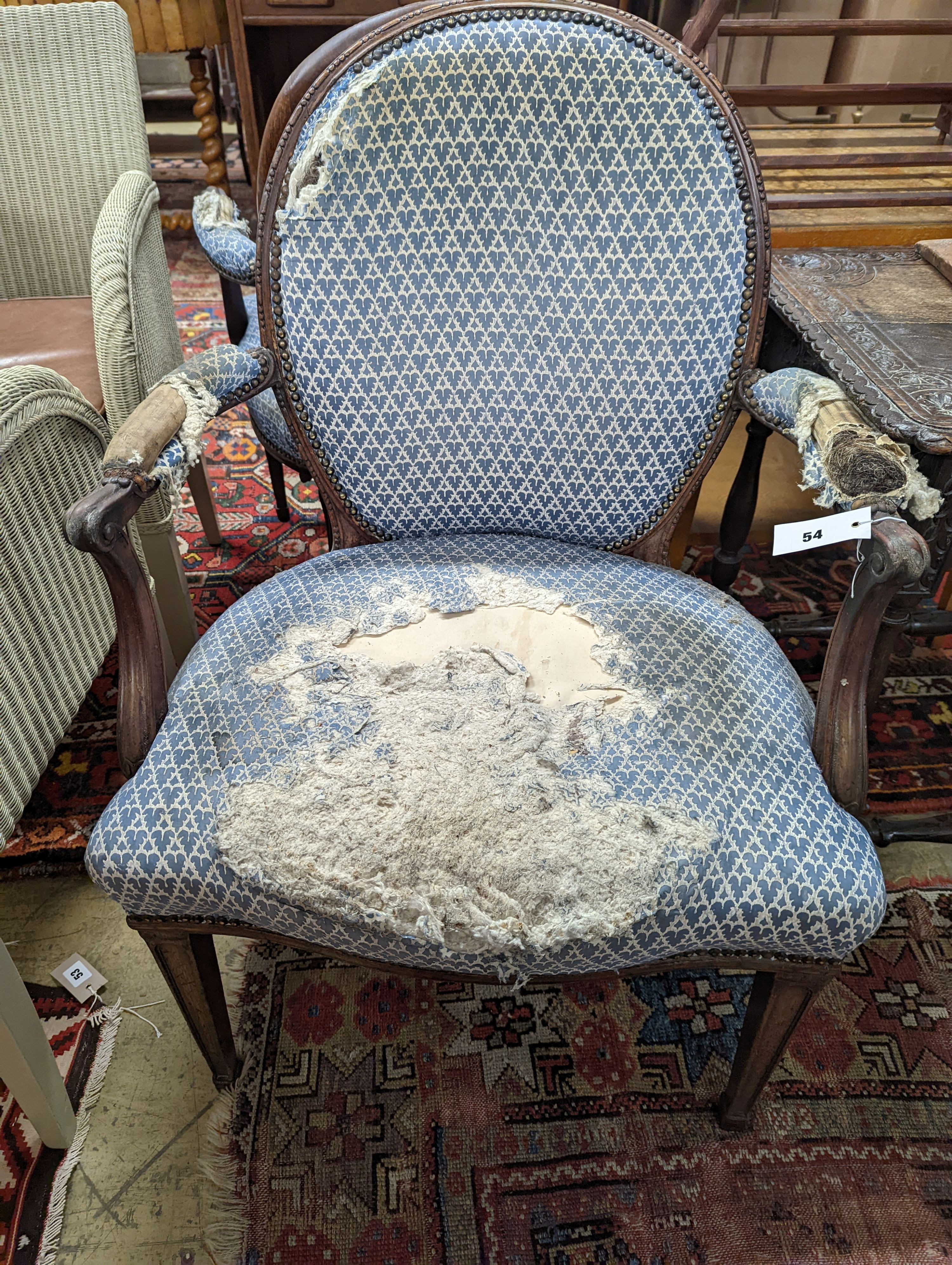 A pair of George III Hepplewhite style mahogany open armchairs, width 64cm, depth 50cm, height 92cm